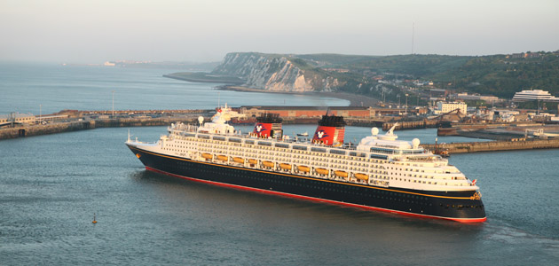 The Disney Magic sailing past the White Cliffs of Dover.