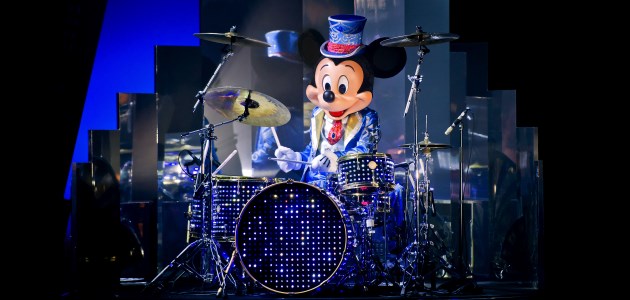 Mickey Mouse playing the drums at Mickey's Christmas Big Band