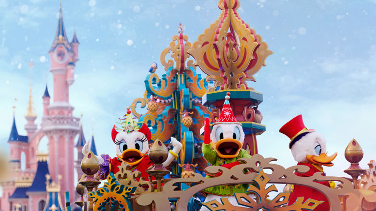 Donald Duck and friends on board a float in Mickey's Dazzling Christmas Parade