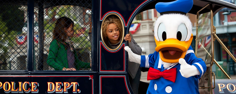 Donald and young Guests on Main Street U.S.A.®