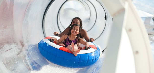 Guests on the splash-tastic AquaDuck water coaster.