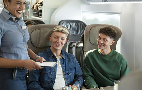 Young couple travelling on the Eurostar in Standard Premier Class