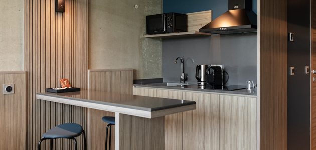 Kitchen and dining area in a Ki Space Hotel & Spa room.