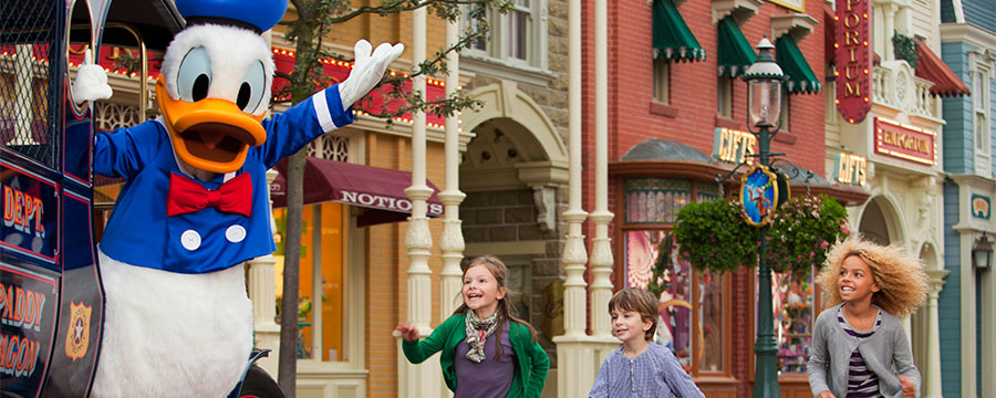 Children walking down Main Street, U.S.A