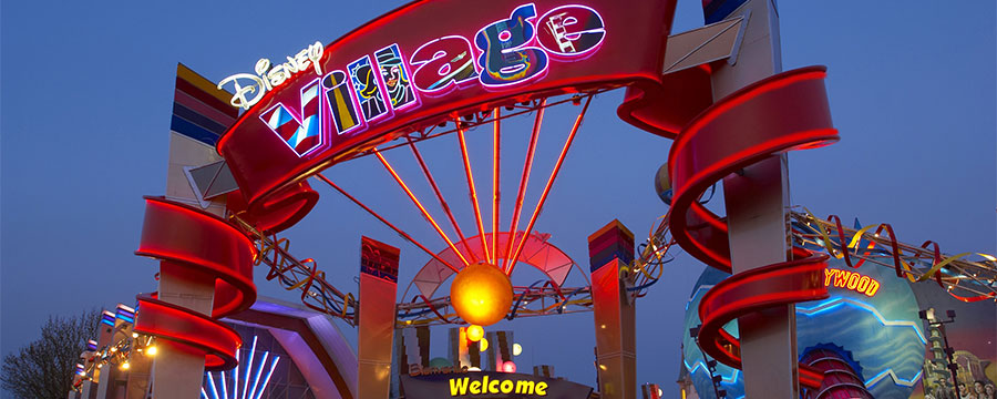 Entrance to Disney Village lit up at night