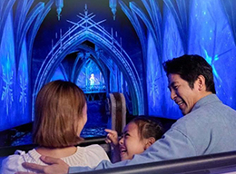 Young family aboard a boat on Frozen Ever After in World of Frozen