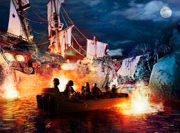 Guests on classic attraction Pirates of the Caribbean in Disneyland Park
