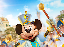 Minnie Mouse and marching band on Main Street U.S.A