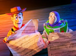 Woody and Buzz from Toy Story performing in TOGETHER: a Pixar Musical Adventure