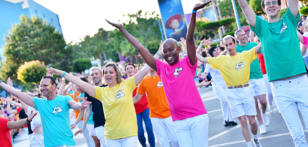 Cast members dancing at Disney Pride Parade