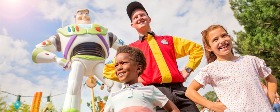 Children in front of Buzz Lightyear at Worlds of Pixar