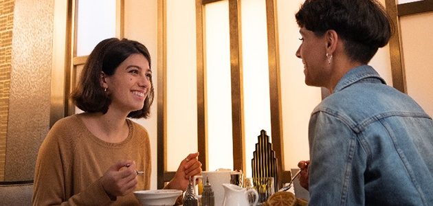 Guests dining at Empire State Club lounge