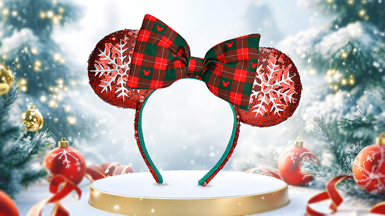 Christmas-themed Disney ears with winter background