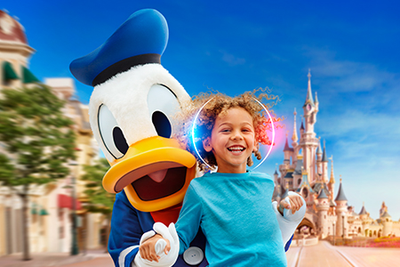 Donald Duck and Young Guest on Main Street at Disneyland Paris