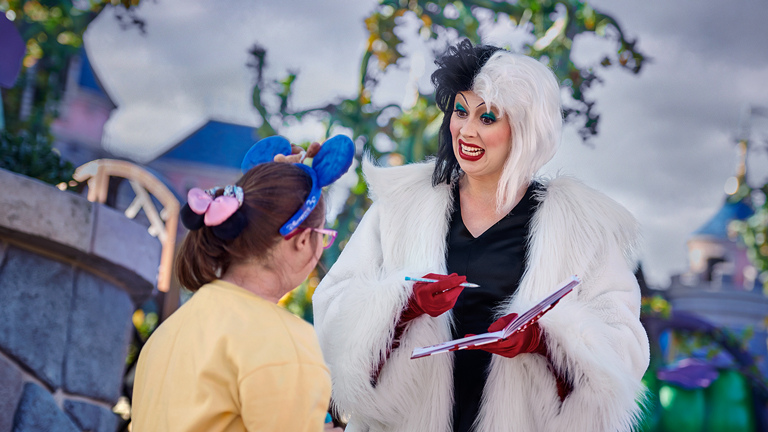Young Guest meets Cruella de Vil at Disney Halloween Festival
