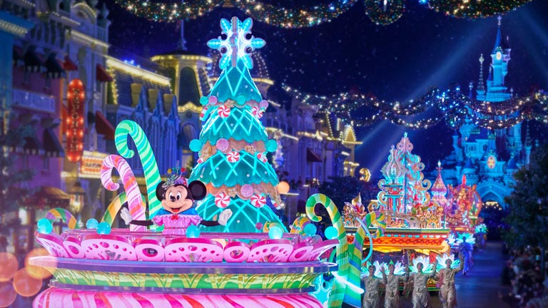 Minnie on board a float in Mickey's Dazzling Christmas Parade