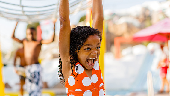 Young guest splashing around at Disney's Blizzard Beach Water Park