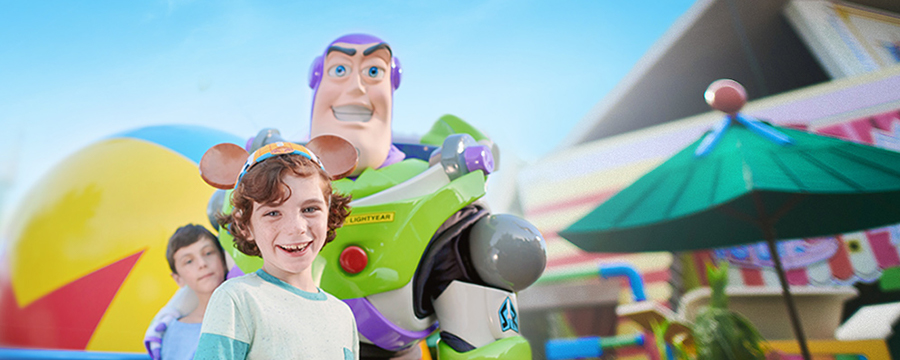Young boy with Buzz Lightyear at Toy Story Land