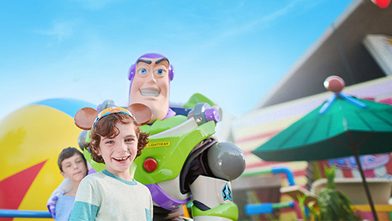 Young Boy With Buzz Lightyear At Toy Story Land