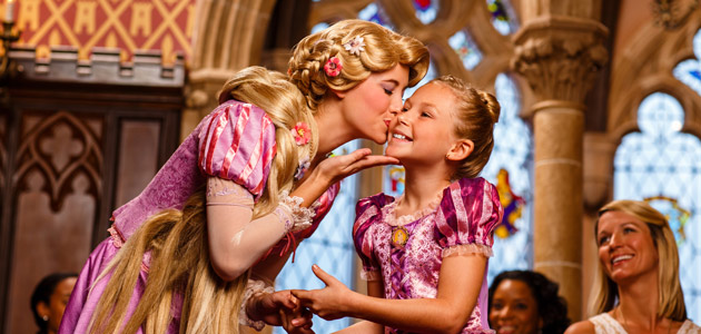 Girl with Rapunzel at Cinderella's Royal Table.