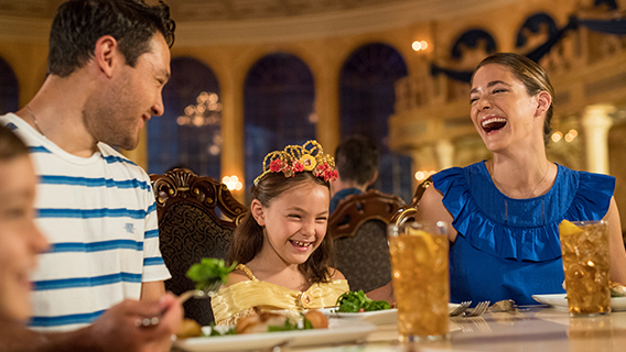Family enjoying table service at signature dining restaurants