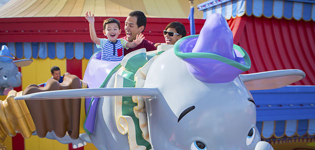 Family enjoying Dumbo the Flying Elephant at Magic Kingdom Park.