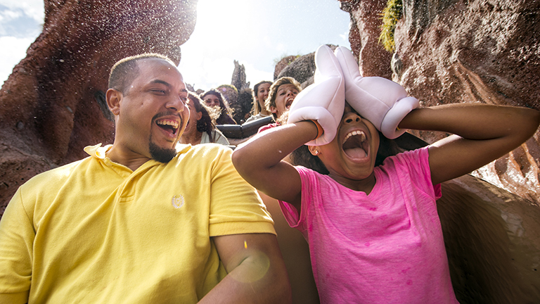 Father and daughter on Splash Mountain in Magic Kingdom