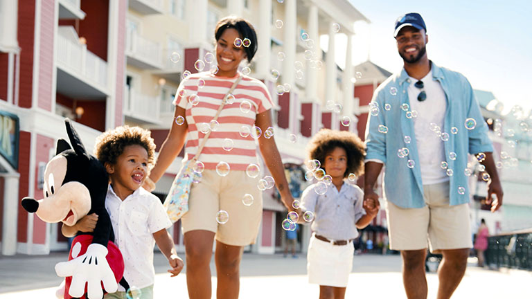 Family taking a stroll down Disney's Boardwalk