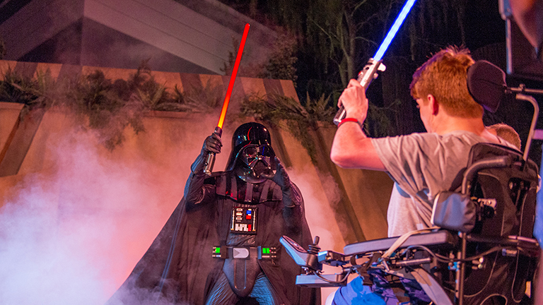 Darth Vader with a guest in a wheelchair