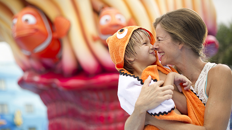 Mother and son smiling at Disney's Art of Animation Resort