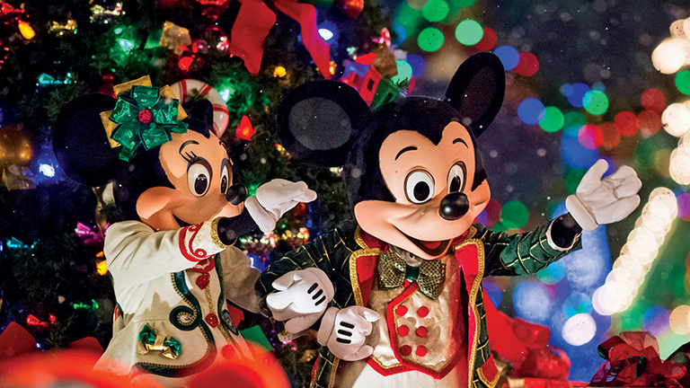 Mickey and Minnie Mouse looking festive at Mickey's Very Merry Christmas Party