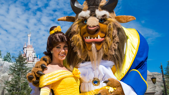 Belle and Beast in front of Cinderella Castle