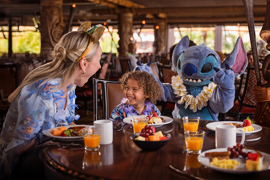 young-girl-having-breakfast-with-mickey-mouse