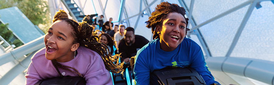 Kids Having Fun on Tron attraction